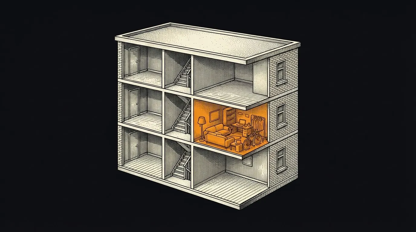 Cutaway of an apartment building with one unit opened to show a tenant's furniture and belongings.